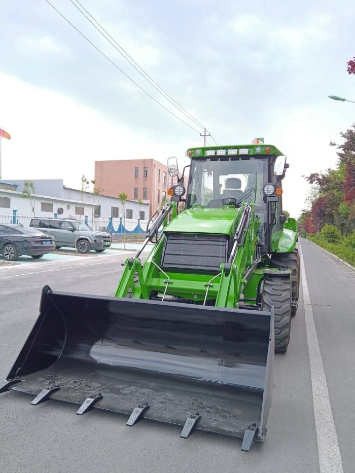 Backhoe loader on rural road